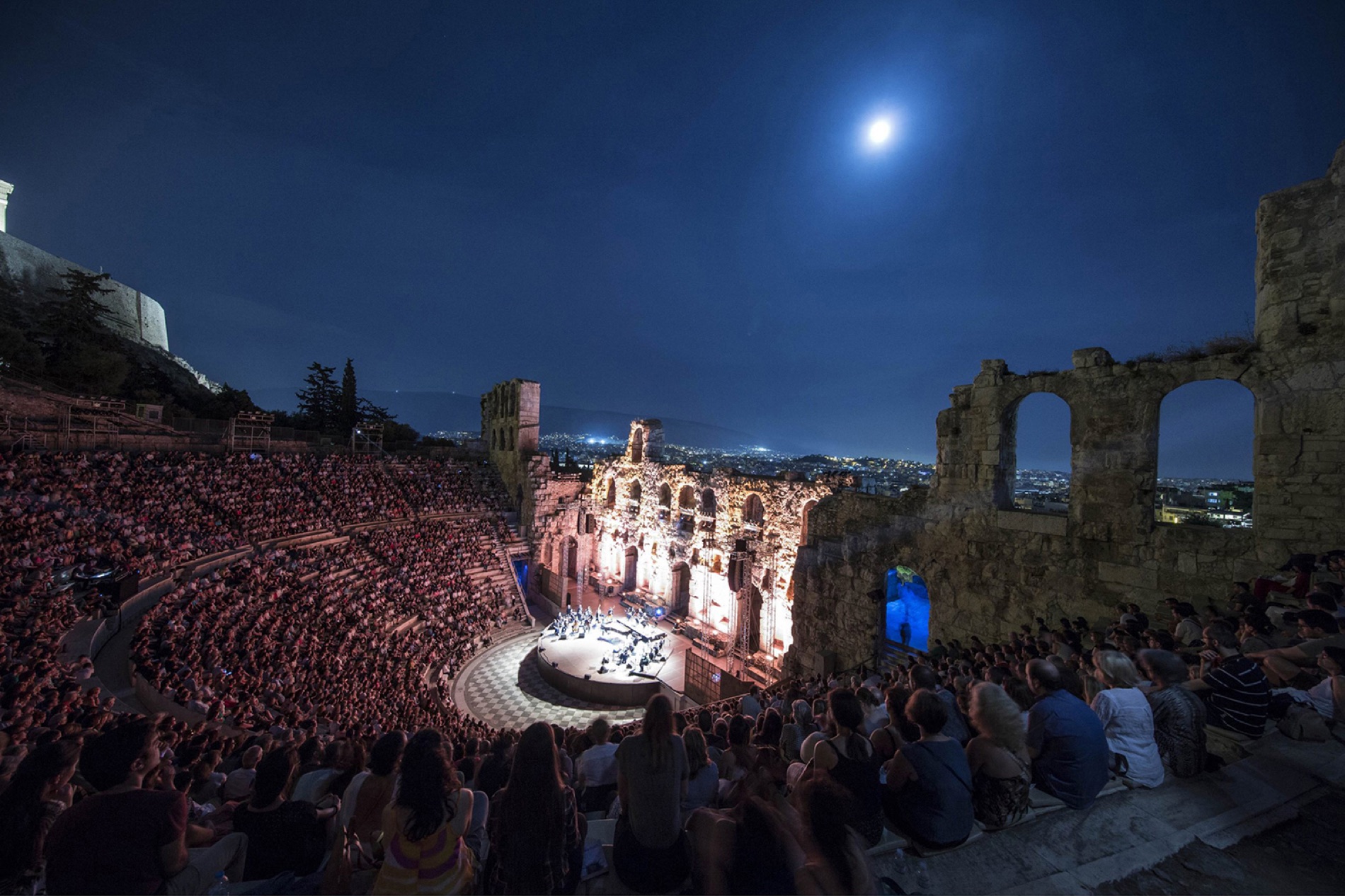 The Odeon of Herodes Atticus seen from above with Athens behind it